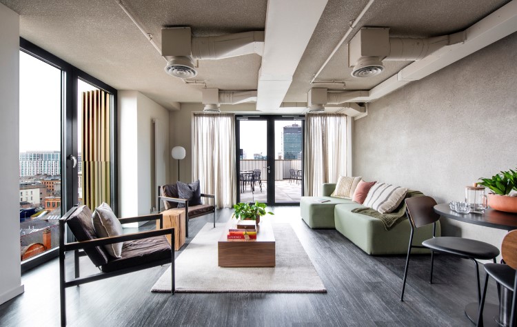 A living space with terrace inside of Kampus' apartments in Manchester