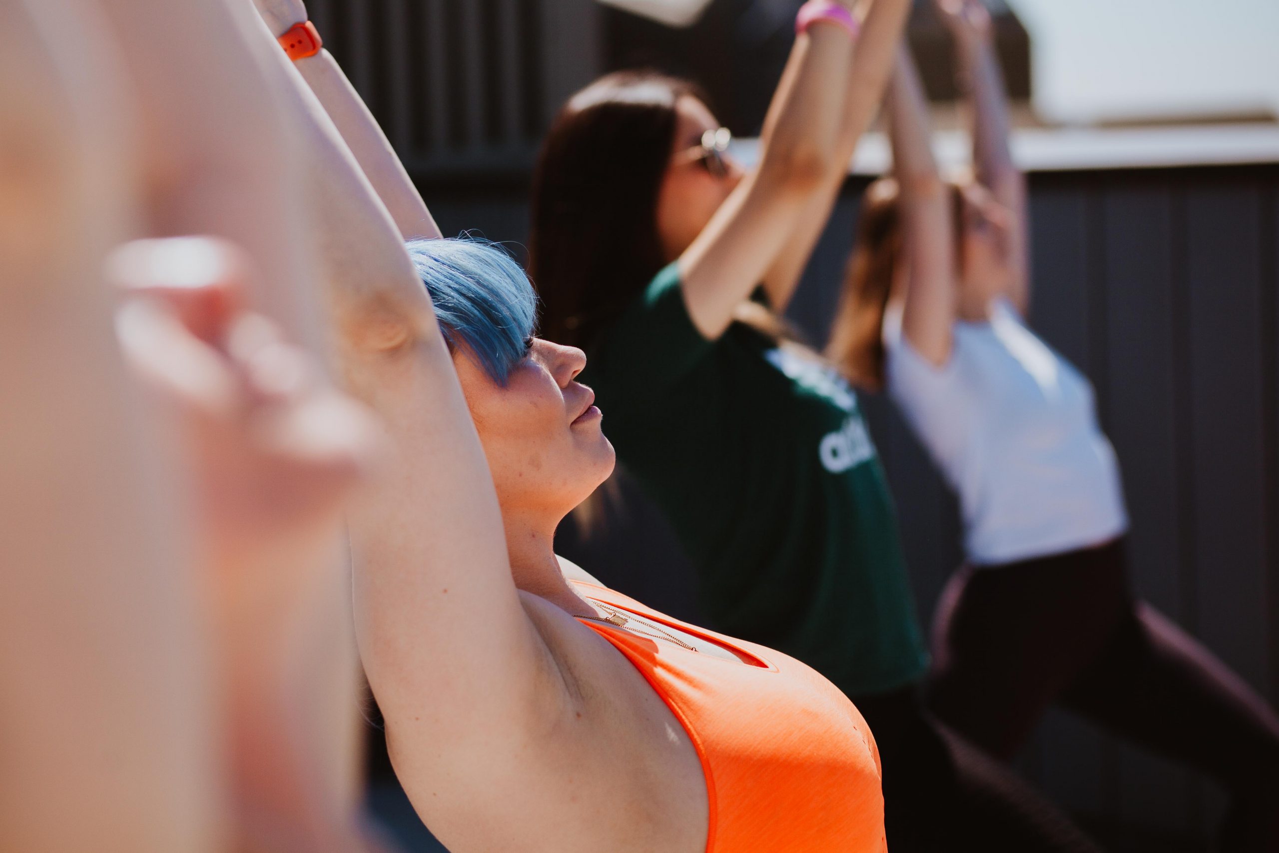 Group yoga session in the sun